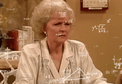 Betty White squinting while equations float around her head
